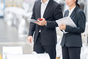 Male engineers and female engineers in the industrial setting demonstrate leadership qualities that are essential for driving organizational change and achieving strategic objectives.