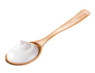 cream sour in wooden spoon isolated white background. Reference for design.