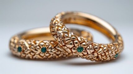 Symbol of Everlasting Love: Golden Wedding Rings Sparkling on White Background