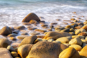 Close-up of pebble beach. Long exposure shots.