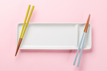 Table with empty plate and chopsticks, epitomizing Japanese food culture