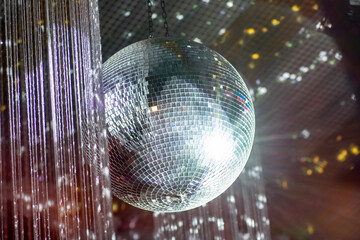 disco ball on a mirror 70s style