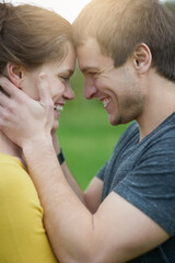 Fototapeta premium Love, happy and couple in nature outdoor for countryside vacation, getaway or holiday together. Romance, hug and young man and woman on date for bonding on weekend trip in Australia for travel.