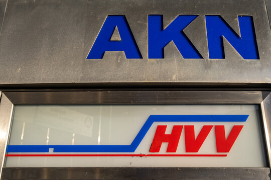 Hamburg, Germany - 01 27 2023: Sign of AKN Eisenbahn GmbH and Hamburger Verkehrsverbund HVV, public transport companies in Hamburg and Schleswig-Holstein
