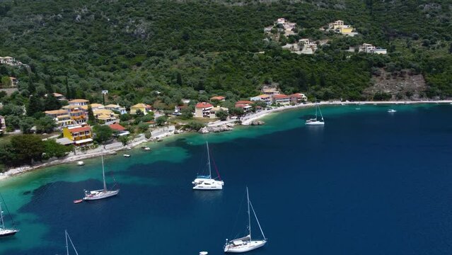 Aerial Orbit over Mikros Poros Gialos Beach Seashore, Lefkada, Greece