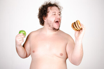 Fototapeta premium Funny fat man on a diet.