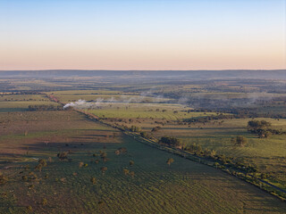 grass fields for livestock landfill on fire smoke
