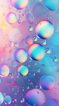 Floating iridescent oil bubbles on water surface with soft  pink and blue gradient background