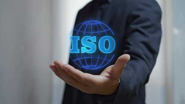 ISO icon. International Organization for Standardization sign and symbol. Requirements, certification, management, standards. Businessman showing animation of ISO icon with neon line world global.