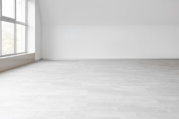 Empty room with stylish clean laminate flooring