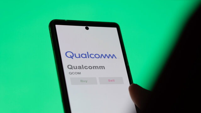 April 09th 2024 , San Diego, California. Close up on logo of Qualcomm on the screen of an exchange. Qualcomm price stocks, $QCOM on a device.