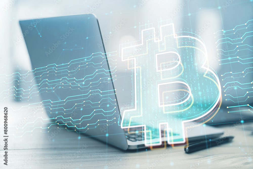 Poster close up of laptop with digital bitcoin sign and circuit on blurry background. online banking, trade