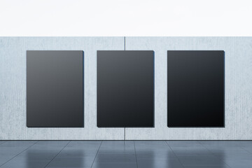 Modern empty interior with black mock up banners on gray wall. Gallery and museum concept. 3D Rendering.