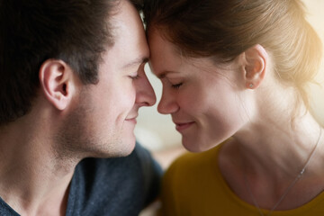 Face, love or smile and couple closeup in home for bonding, romance or togetherness with flare. Connection, date or happy with forehead touch of man and woman in apartment for support or trust