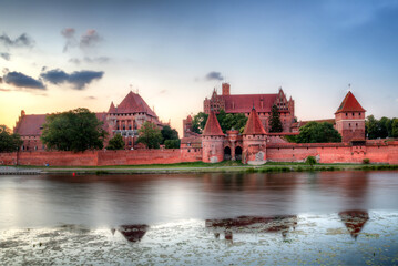Gothic castle in Malbork at sunrise, Poland.