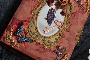 Obraz premium Antique Book With Colorful Gemstones and Mirror. Fairy Tale Romance Book
