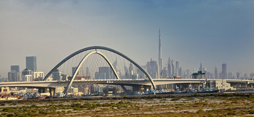 Dubai skyline of infinite bridge and burj khalifa