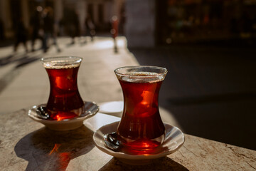 Turkish tea in cups on the street in a cafe. High quality 4k footage