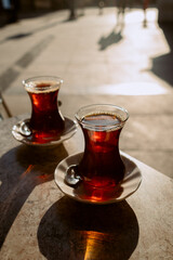 Turkish tea in cups on the street in a cafe. High quality 4k footage
