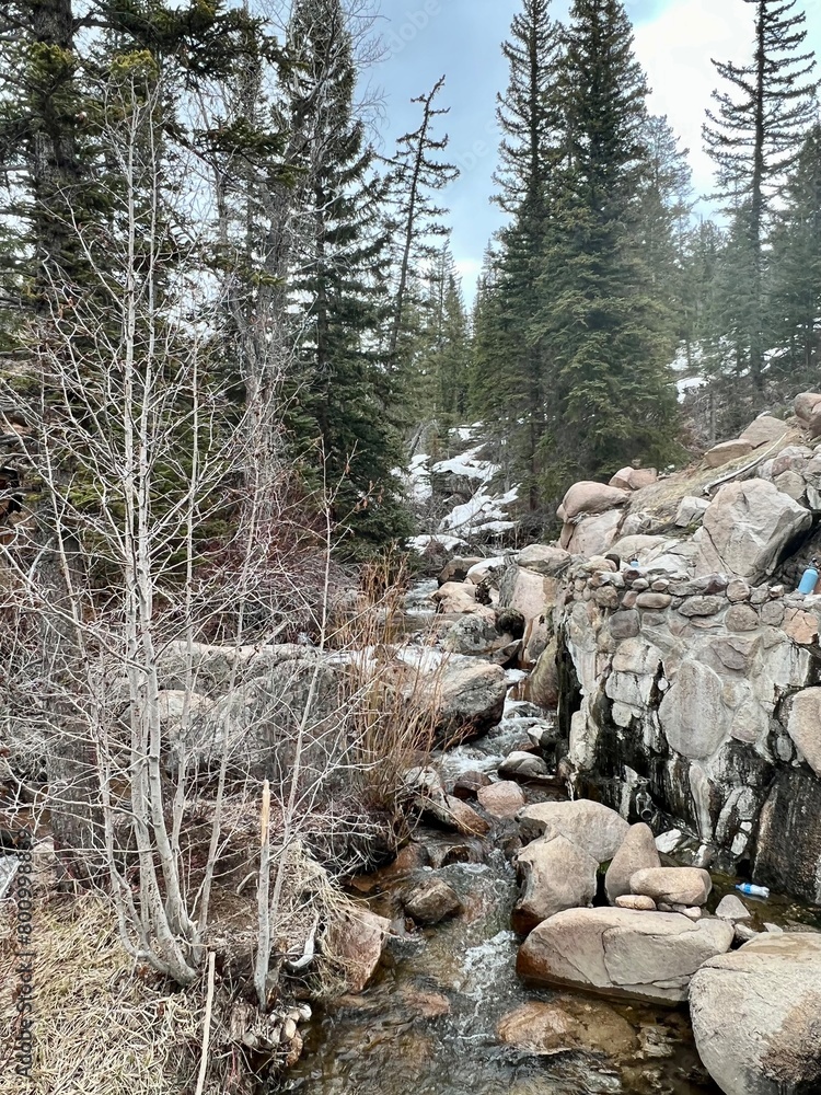 Sticker some rocks are placed on the side of a mountain stream