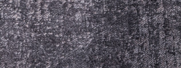 Texture of velvet dark gray and silver background from soft upholstery textile material, macro.