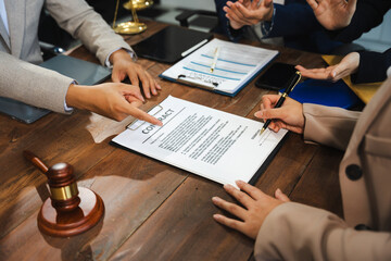 Close up businessman or Lawyer signing contract making a deal, classic business at office in the...