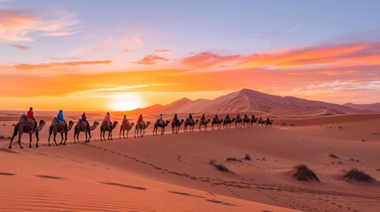 Bedouins on camels travel through the desert