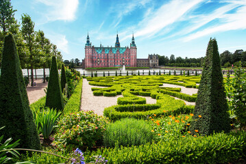 beautiful landscape with magical incredible gardens and park Frederiksborg slot Castle near...