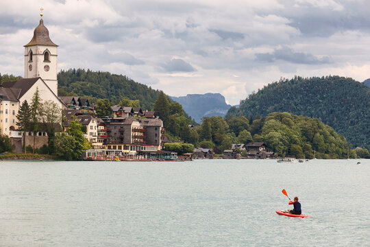 Padling on Wolfgangsee lake. Salzburg region. Austrian mountain landscape