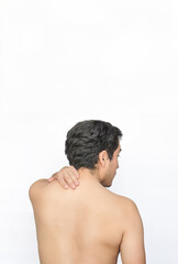 Shirtless man with neck pain showing back with white background and space for text above.