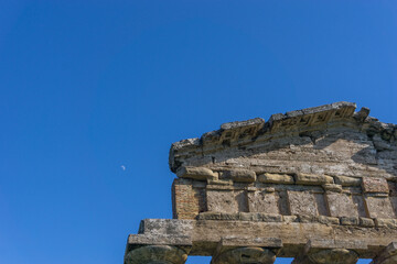 Moon over temple of Athena also known as Temple of Ceres at famous Paestum Archaeological UNESCO World Heritage Site, Salerno, Campania, Italy