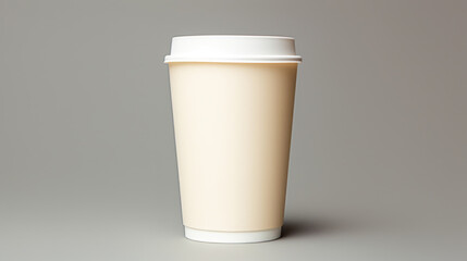 White paper cup of coffee on a grey background. Space for text or design.
