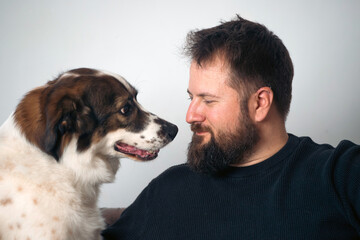 Man with his dog, close up portrait.
