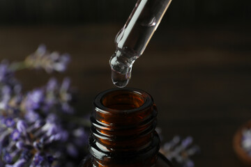 Lavender oil in a bottle with a dropper close-up