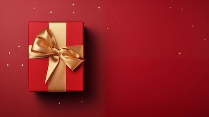 Elegant red gift box with golden ribbon on festive background