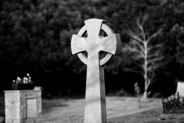 Celtic cross in Cambridgeshire park, in grayscale