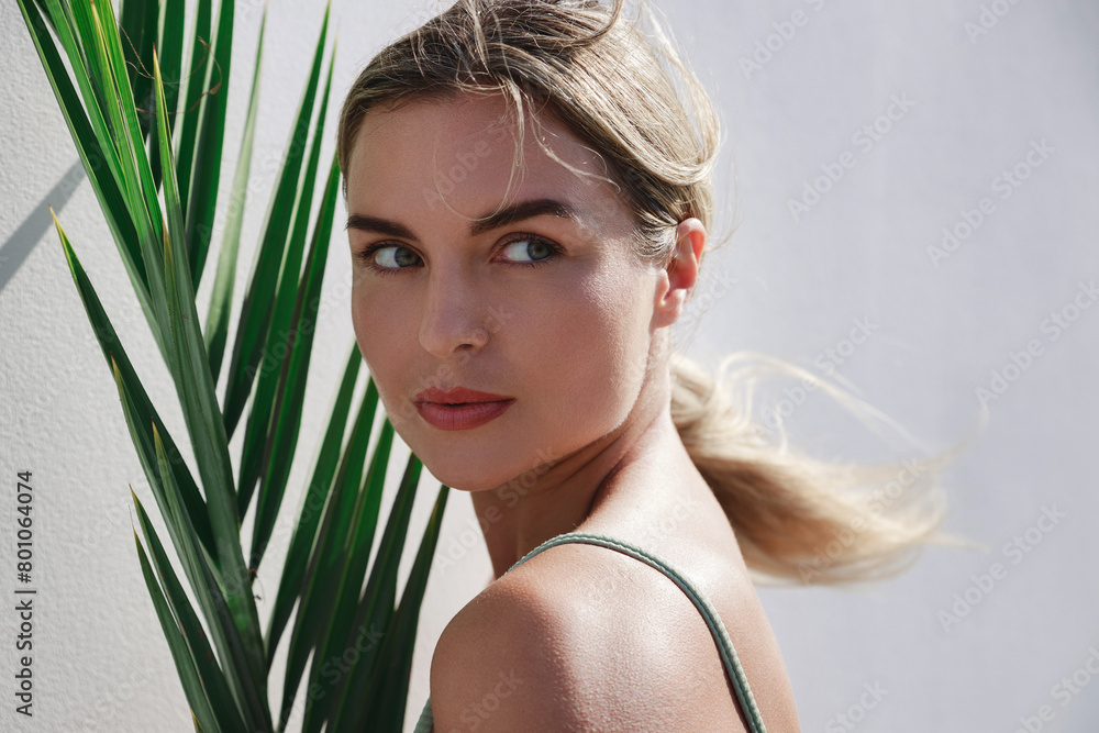 Sticker portrait of beautiful young woman posing with palm leaf on white background