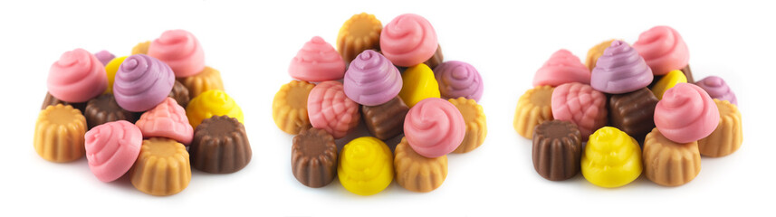 Pile jelly candies in the form of a meringue and cupcake isolated on white