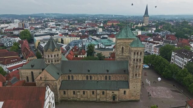 Aerial drone view of Dom St. Petrus in Osnabr&uuml;ck, Germany. St. Peter's Cathedral serves as the cathedral of the Roman Catholic Diocese of Osnabr&uuml;ck. 