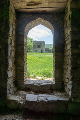 Tower in the courtyard of Nichbisi fortress, Georgia. View from arch pass of the bath.