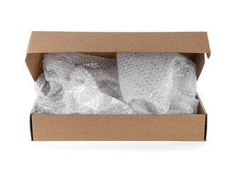Transparent bubble wrap in cardboard box isolated on white