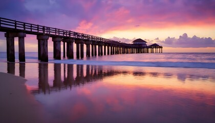 Obraz premium Bridging Day and Night: Sunset Scenes on Coastal Piers