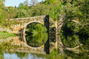 medieval bridge on the Arnoia river in the medieval town of Allariz