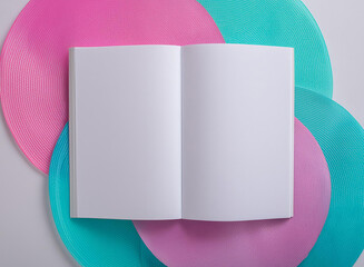 top view of white empty book on colorful color background