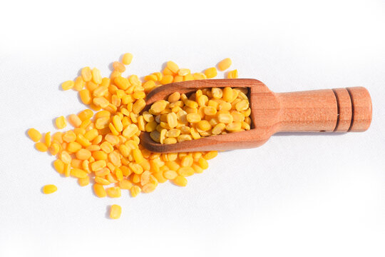 Traditional Indian deep-fried moong dal namkeen - The mung bean, alternatively known as the green gram, maash, or moon in spooon پیلی دال