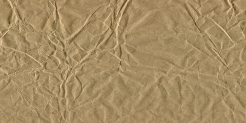 Crumpled Brown Paper Textured Background. Grunge Texture with Creases and Wrinkles