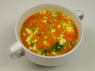 Hot pea soup in a ceramic bowl, healthy eating