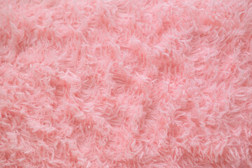 Close up pink fur texture or carpet for background.