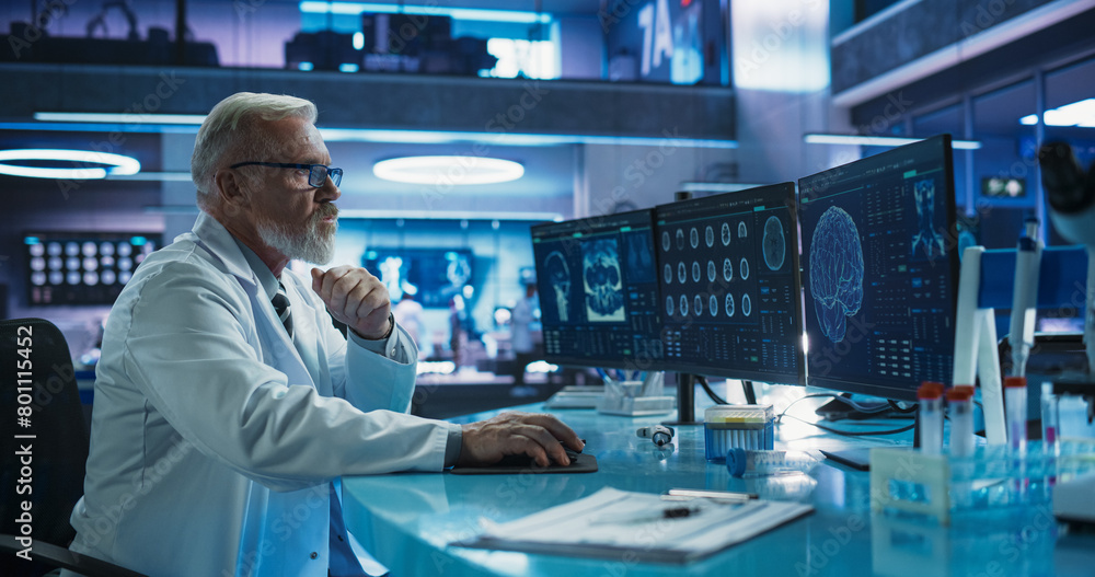 Poster Senior Male Neuroscientist Using Desktop Computer To Analyze MRI Scans Of Brain In Medical Research Center Laboratory. Caucasian Surgeon Studying CT Scan Of Patient Suffering From Brain Tumor.