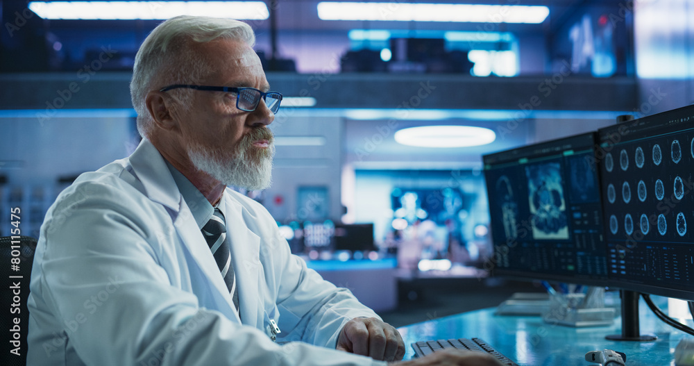 Poster Senior Male Neuroscientist Using Desktop Computer To Analyze MRI Scans Of Brain In Medical Research Center Laboratory. Caucasian Doctor Studying CT Scan Of Stroke Patient's Brain, Finding Solutions.
